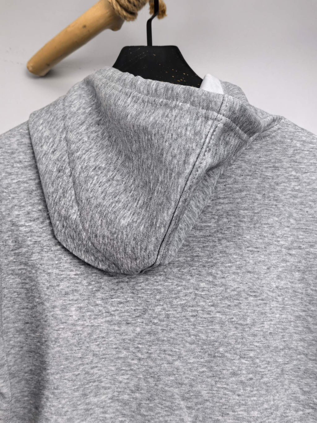 Gray hoodie with hood and ribbed collar, back view