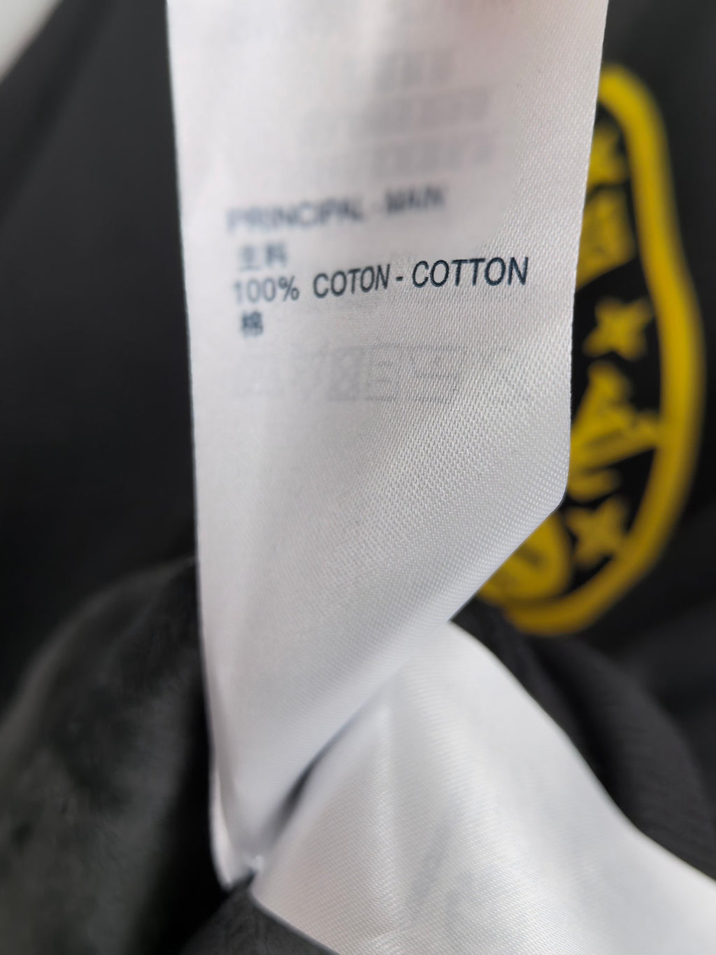 White care label on Louis Vuitton hooded sweatshirt: 100% cotton
