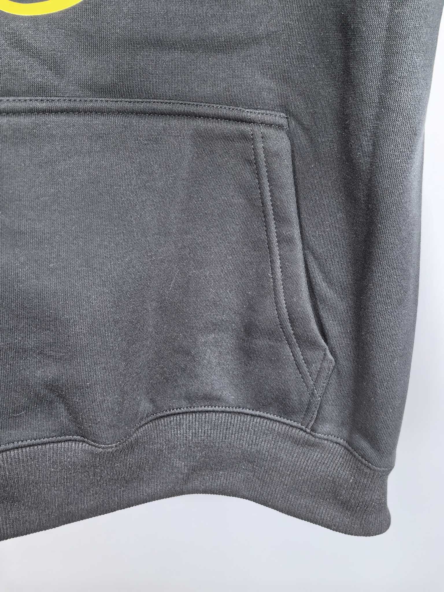 Dark gray Louis Vuitton hooded sweatshirt front pouch pocket detail