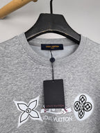 Heather gray sweatshirt collar with multicolor and black logo graphic detail