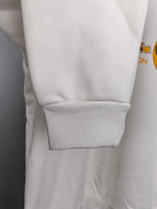 White sweatshirt sleeve with ribbed cuff and ribbed hem