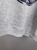 Grey sweatshirt hem and ribbed bottom cuff