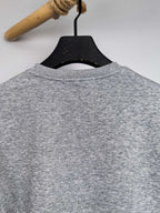 Grey sweatshirt back view with crew neck