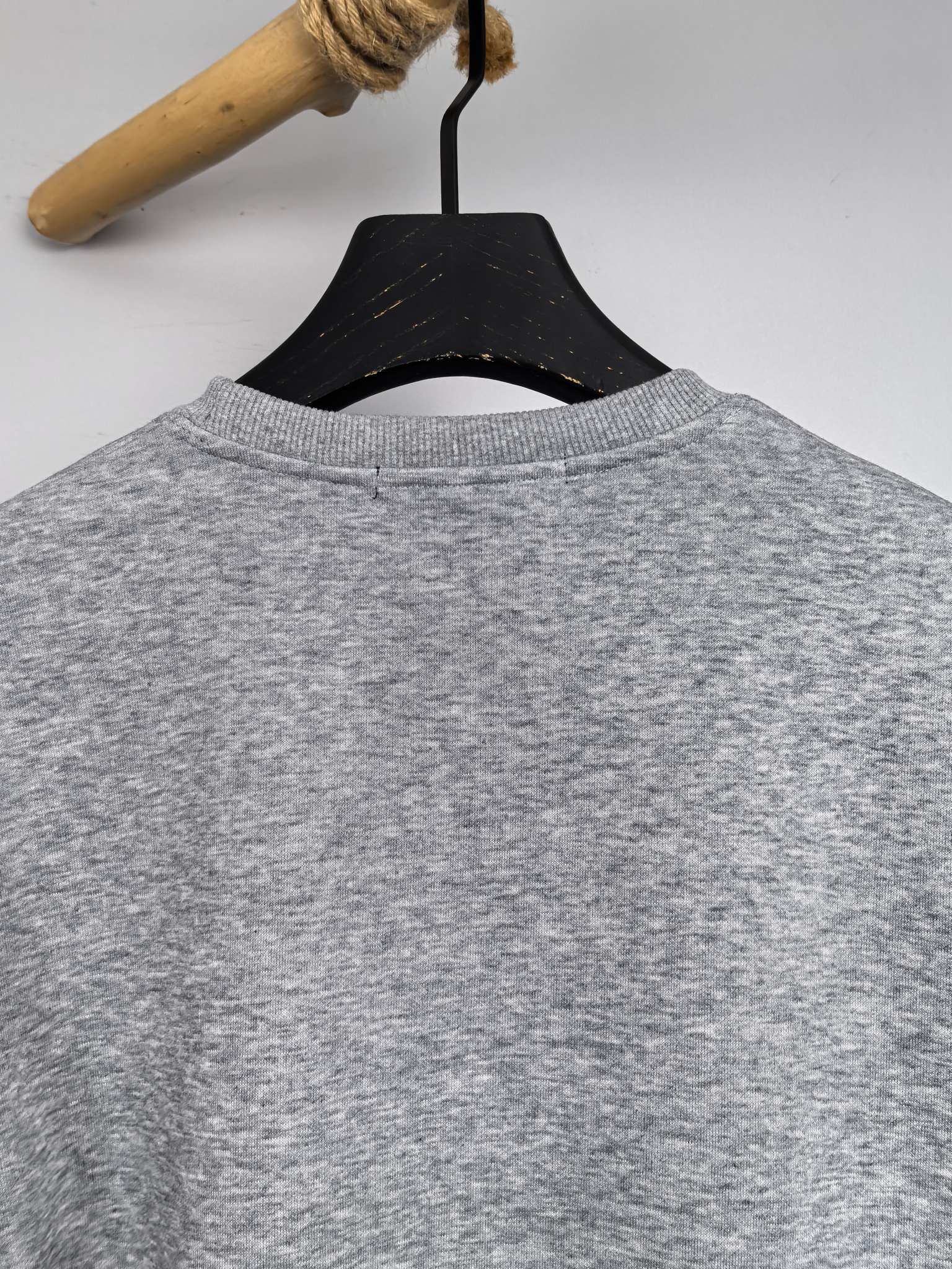 Grey sweatshirt back view with crew neck
