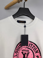 White long-sleeve sweatshirt neckline with zipper and large pink logo print