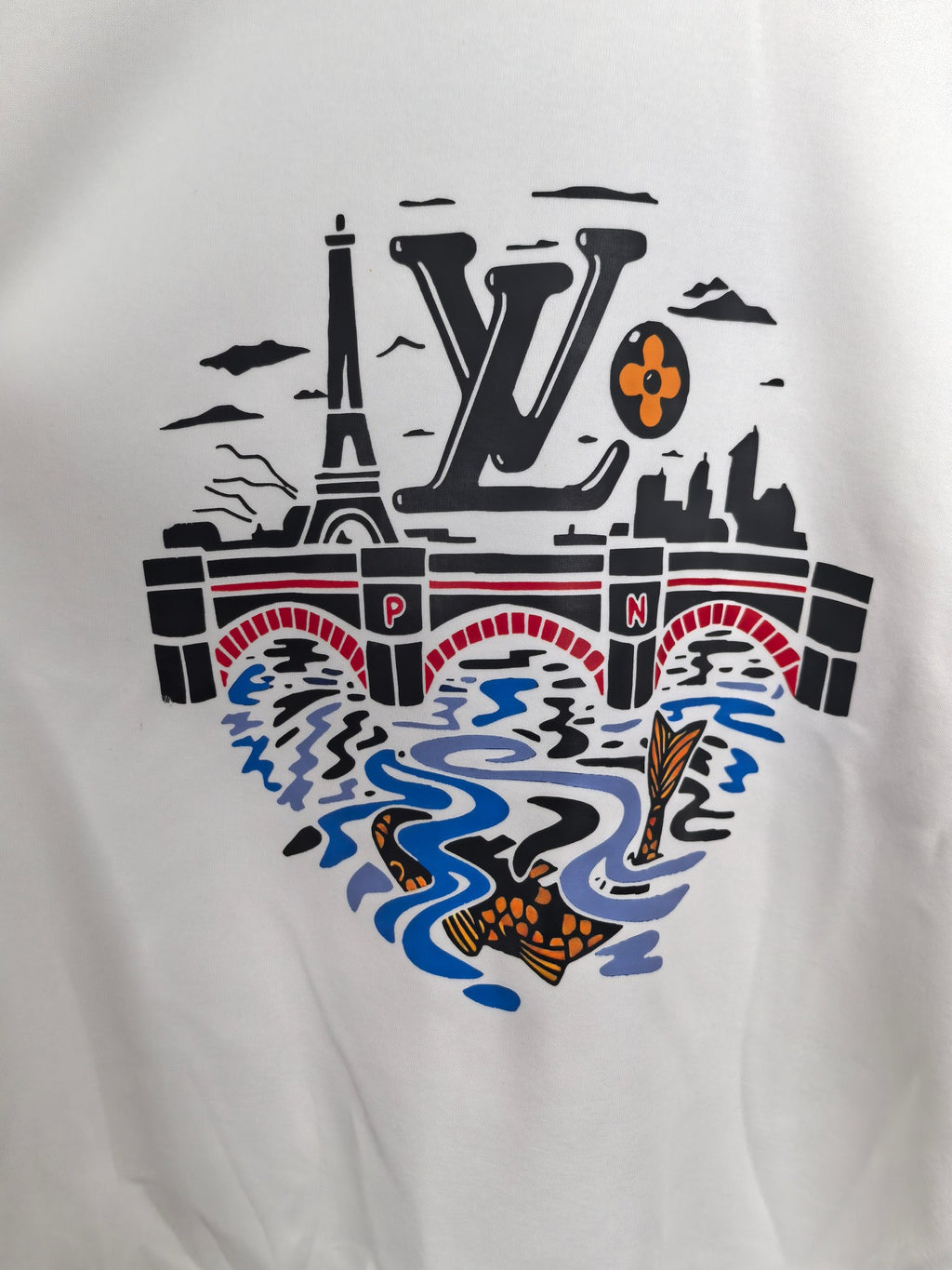 White sweatshirt front with large colorful graphic logo and patterns