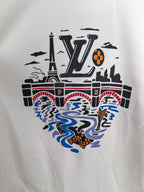 White sweatshirt front with large colorful graphic logo and patterns