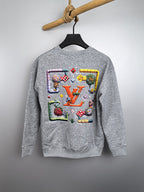 Light gray crewneck sweatshirt with large multicolor LV-style logo graphic