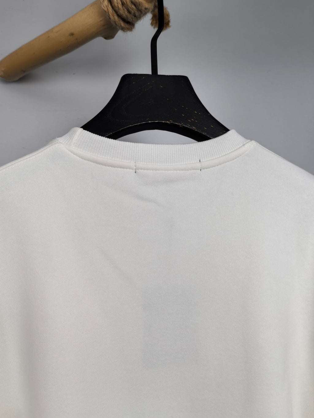 Louis Vuitton sweatshirt collar close-up in white with back neck seam