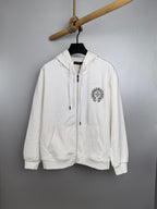 White zip-up hoodie with hood, front pockets, and small chest logo patch