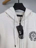 White zip-up hoodie with hood and drawstrings, showing hanging size/brand tag