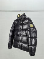 Moncler black quilted puffer jacket with stand collar and chest badge detail