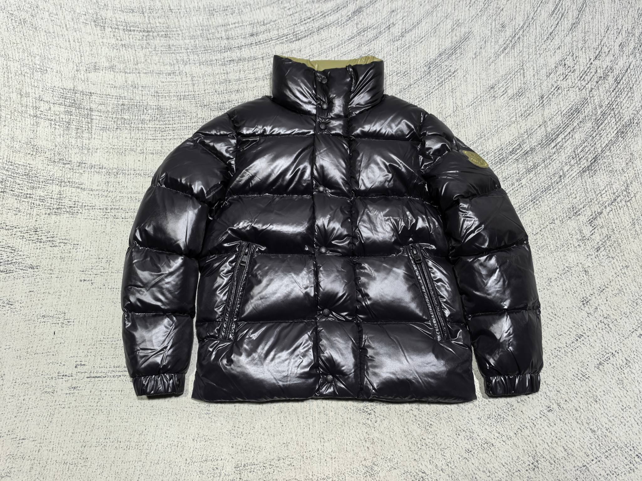 Moncler black quilted puffer jacket with stand collar and chest patch pockets
