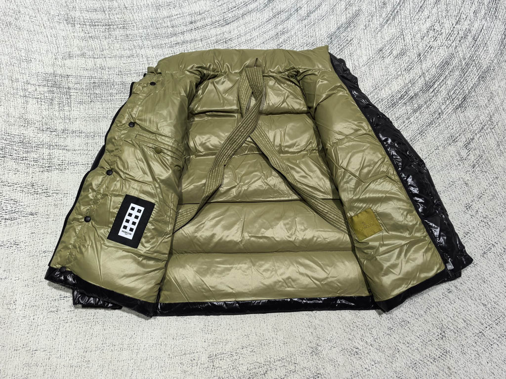 Moncler olive quilted puffer jacket with black side panels and stand collar