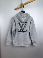 Heather gray Louis Vuitton hoodie with large LV logo on the back