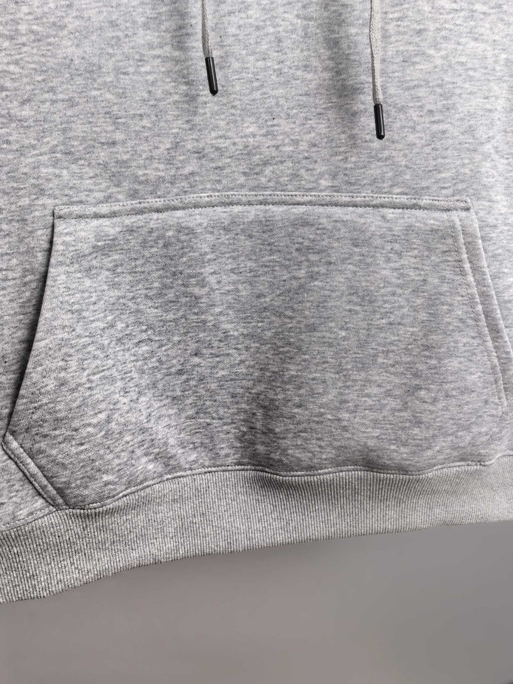 Heather gray hoodie kangaroo pocket with drawstring hood cords
