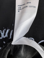 Inside hoodie fabric label showing 100% cotton and “Louis Vuitton” brand text