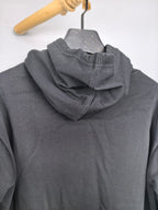 Dark gray pullover hoodie back view with hood and drawstring knot