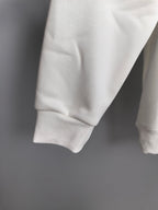 White hoodie cuffs and hem on long sleeves