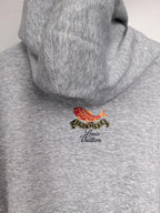 Gray hoodie back view with small fish and “Louis Vuitton” emblem