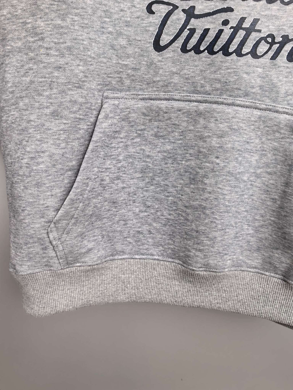 Gray hoodie front hem with ribbed cuffs and kangaroo pocket