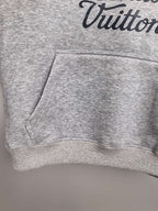 Gray hoodie front hem with ribbed cuffs and kangaroo pocket