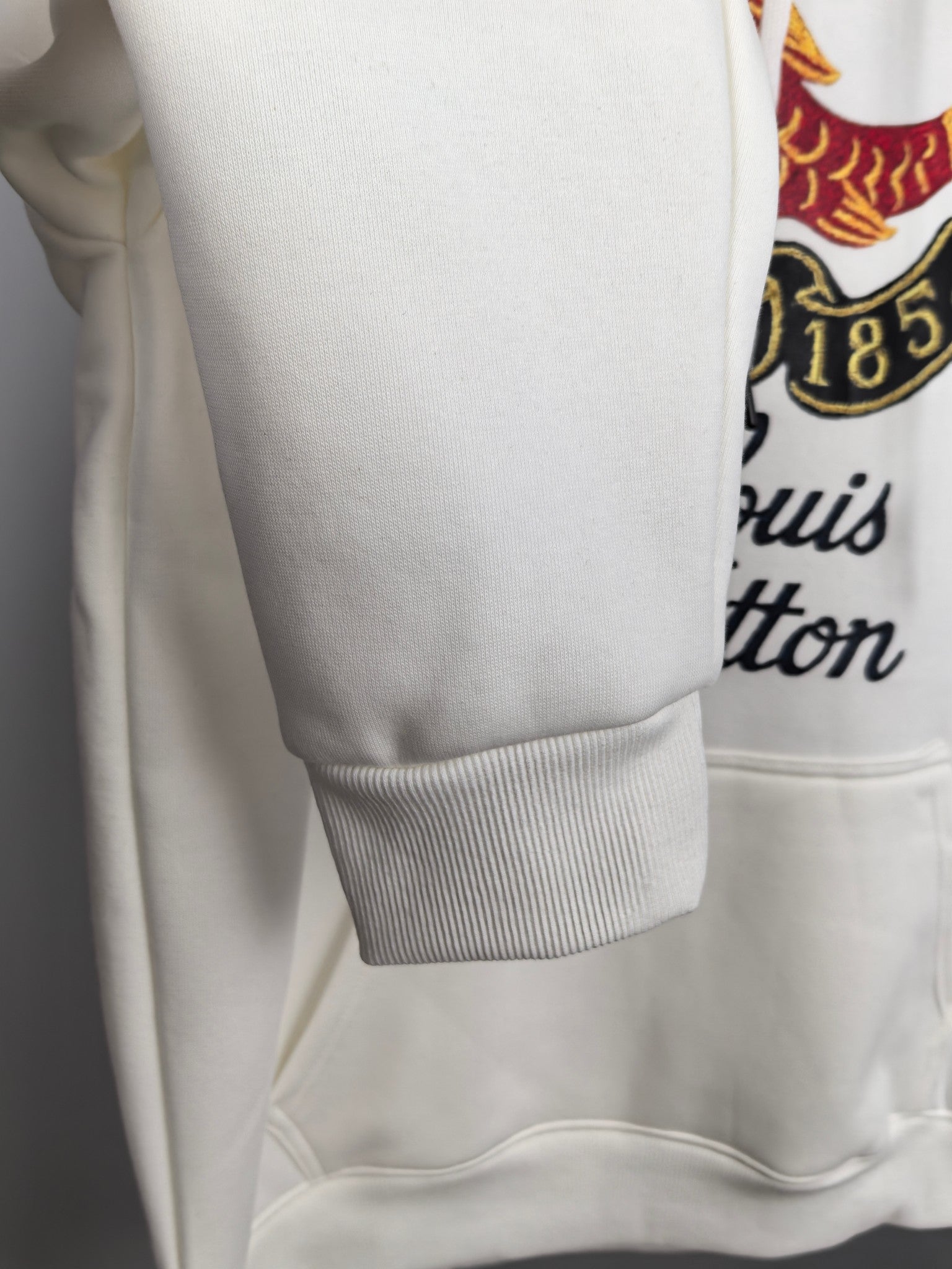 White hoodie sleeve with ribbed cuff