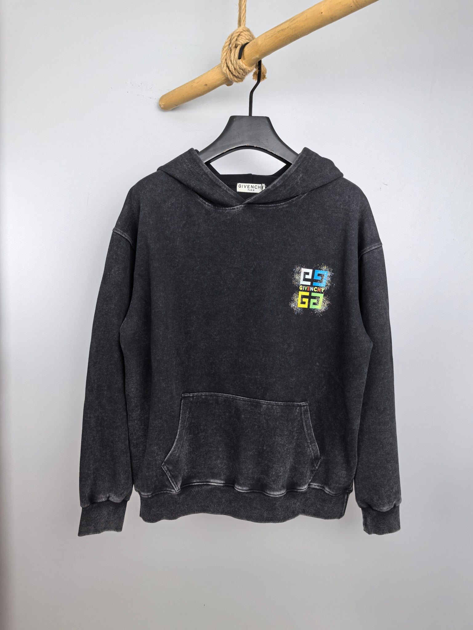 Charcoal hoodie with front pocket and small Givenchy logo patch