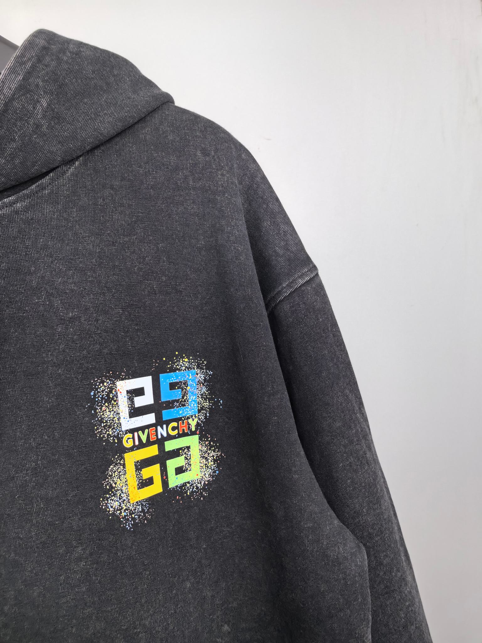 Charcoal hoodie back with large Givenchy logo graphic