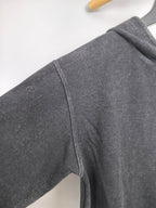 Charcoal hoodie sleeve with curved seam and rib cuff