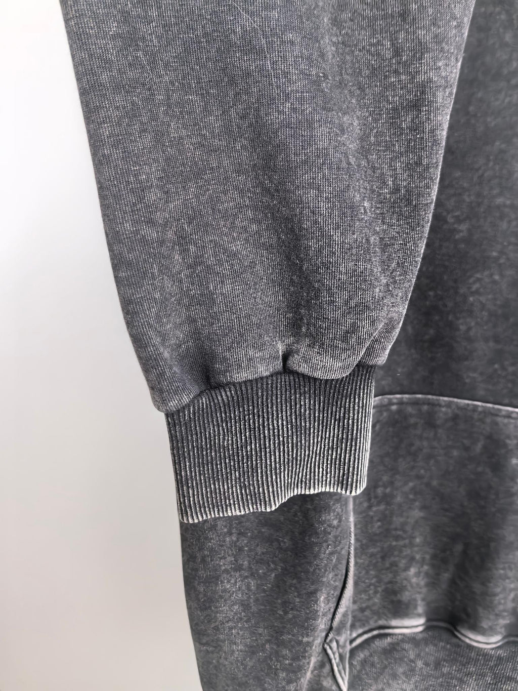 Charcoal hoodie sleeve with ribbed cuff and ribbed hem