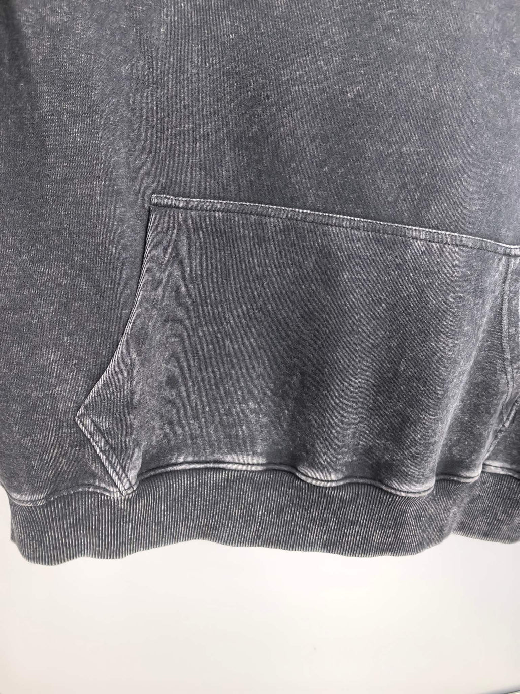 Charcoal hoodie front hem and kangaroo pocket with ribbed cuff