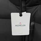 Moncler logo hang tag on black puffer jacket