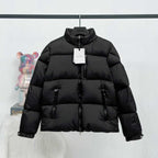 Long black puffer jacket, full-zip stand collar with quilted panels