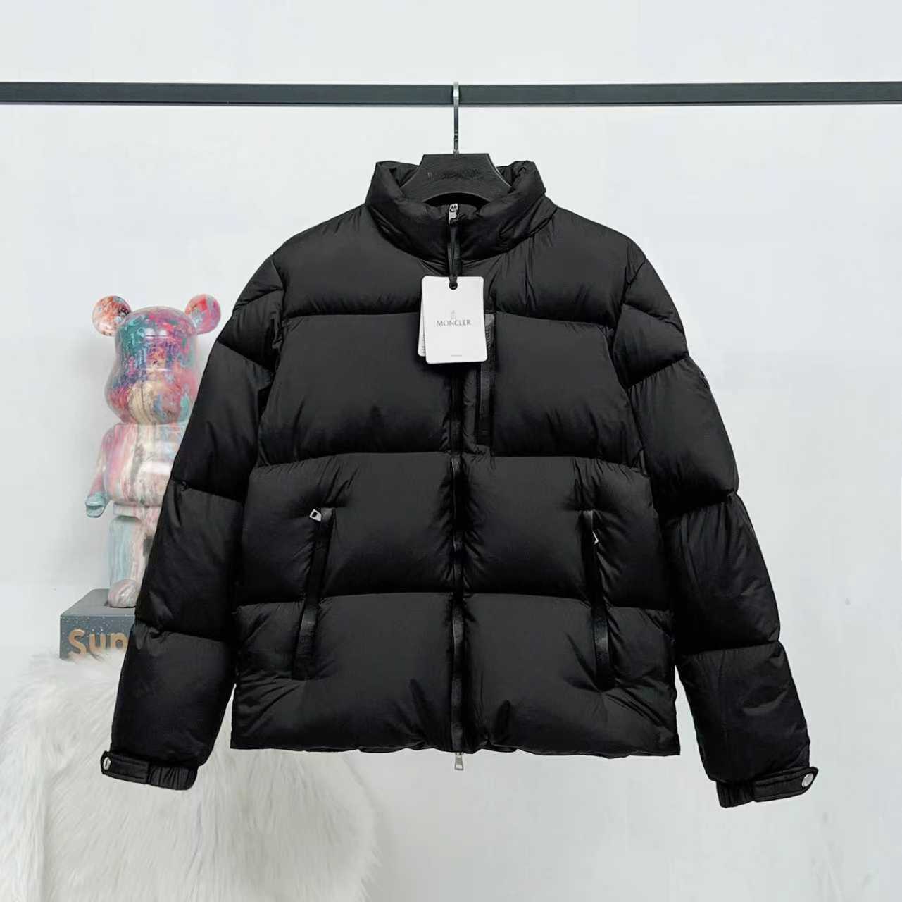 Long black puffer jacket, full-zip stand collar with quilted panels