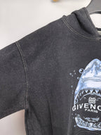 Givenchy charcoal hoodie side view with partial shark graphic on the sleeve