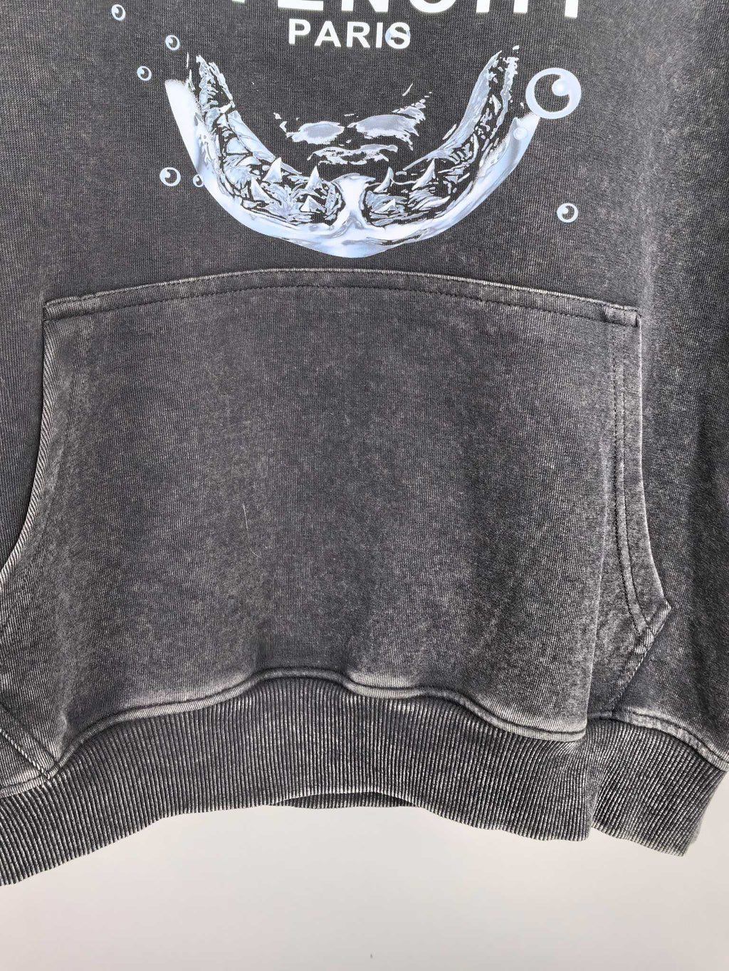 Givenchy charcoal hoodie front pocket and ribbed hem detail