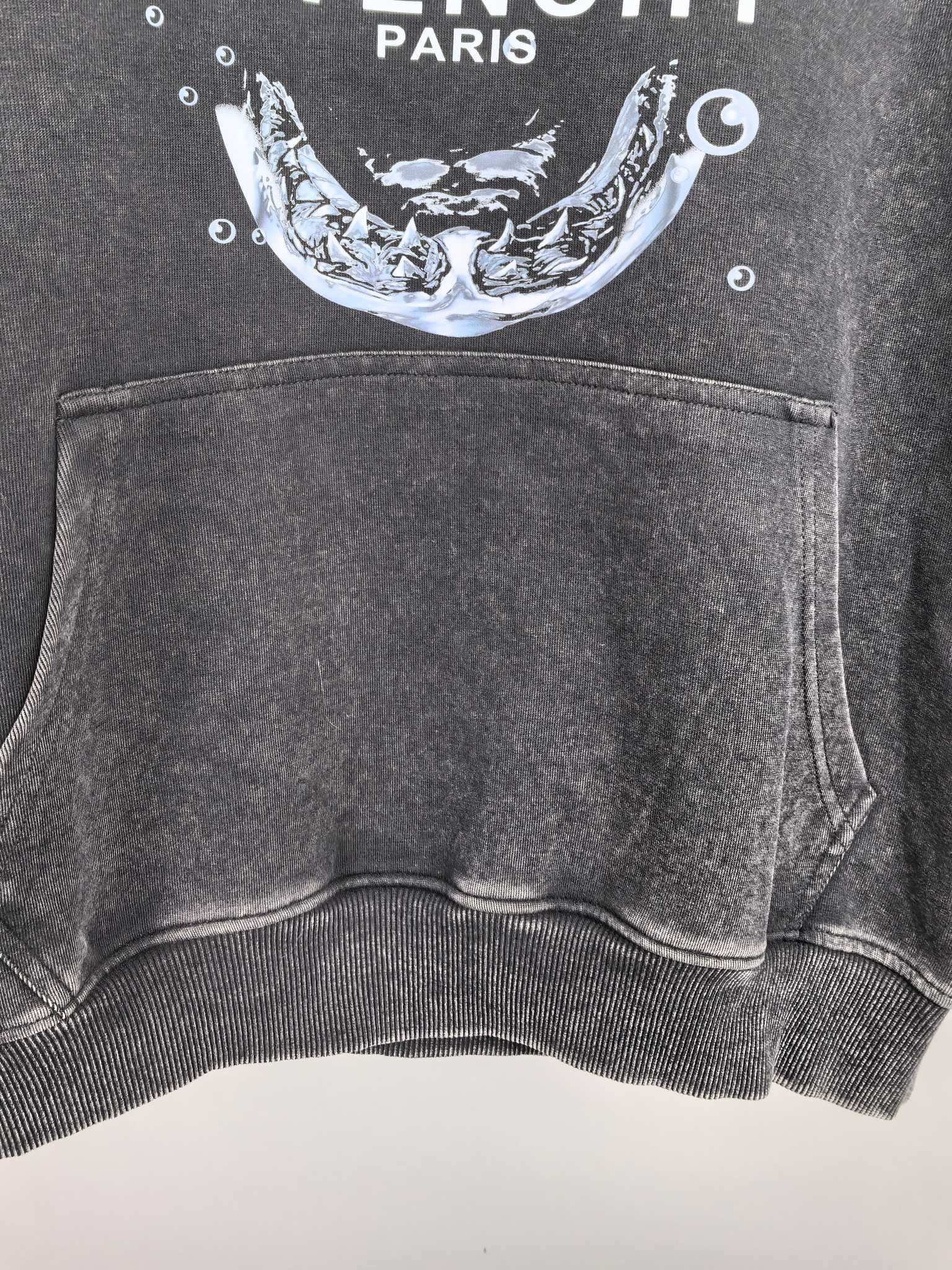 Givenchy charcoal hoodie front pocket and ribbed hem detail