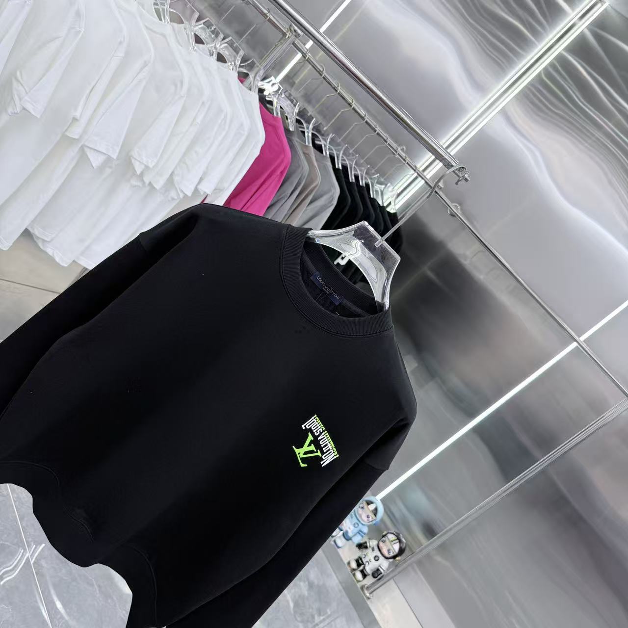 Black Louis Vuitton crewneck sweatshirt with neon graphic chest logo