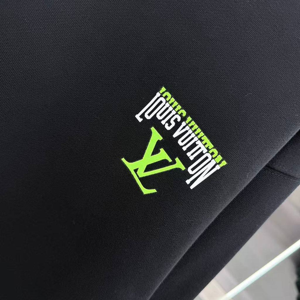 Black Louis Vuitton logo patch in green and white on sweatshirt