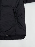 Prada hooded puffer jacket hem, dark black, side view