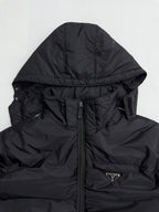 Prada hooded puffer jacket, close-up of hood and front zipper