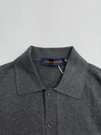 Heather gray polo shirt collar and button placket with Louis Vuitton neck label