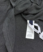 Heather gray polo shirt interior neck label with size tag and care sticker