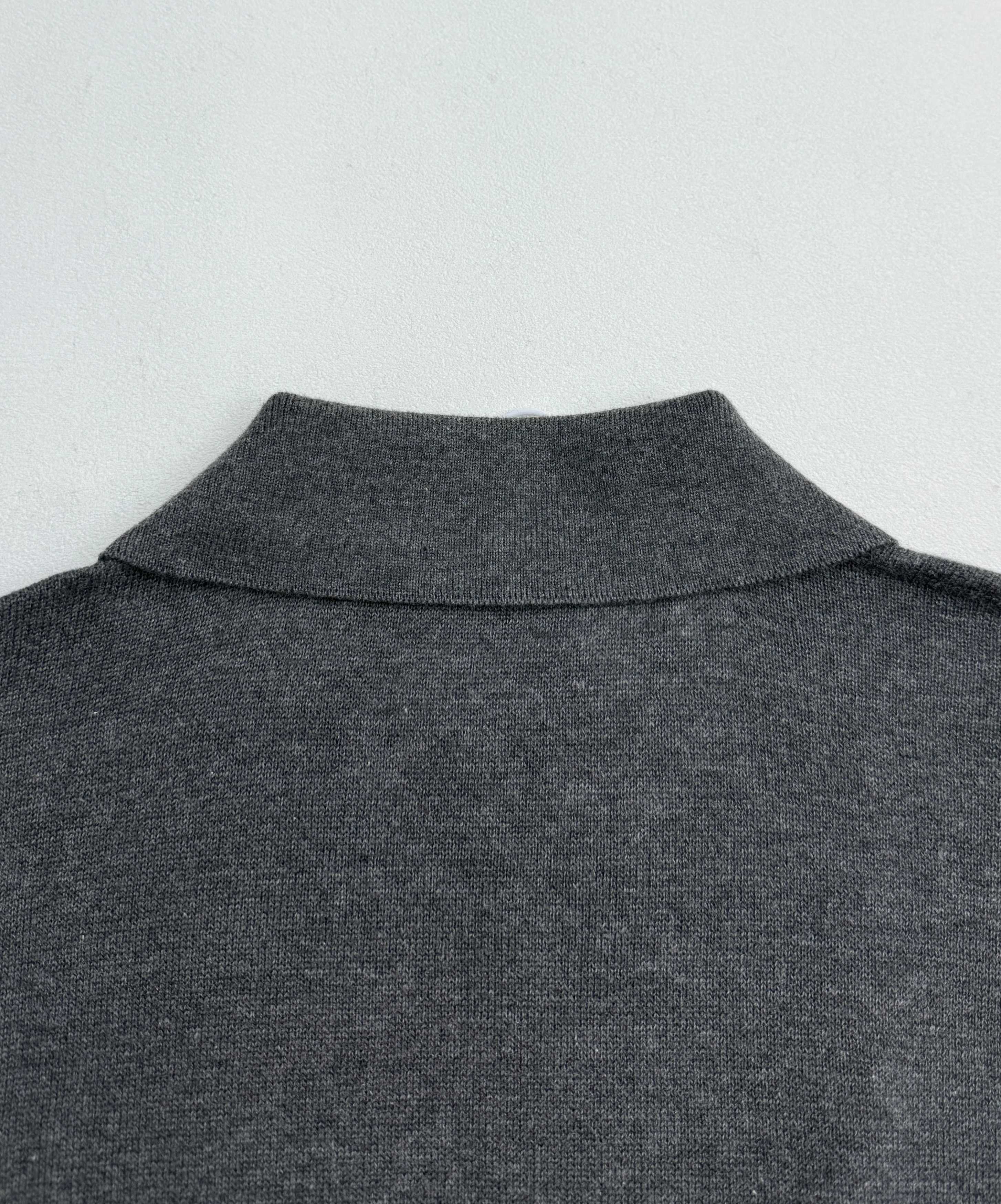 Heather gray polo shirt back collar with knit texture