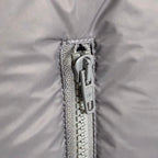 Balenciaga long jacket, gray puffer with front zipper and fabric zipper pull detail