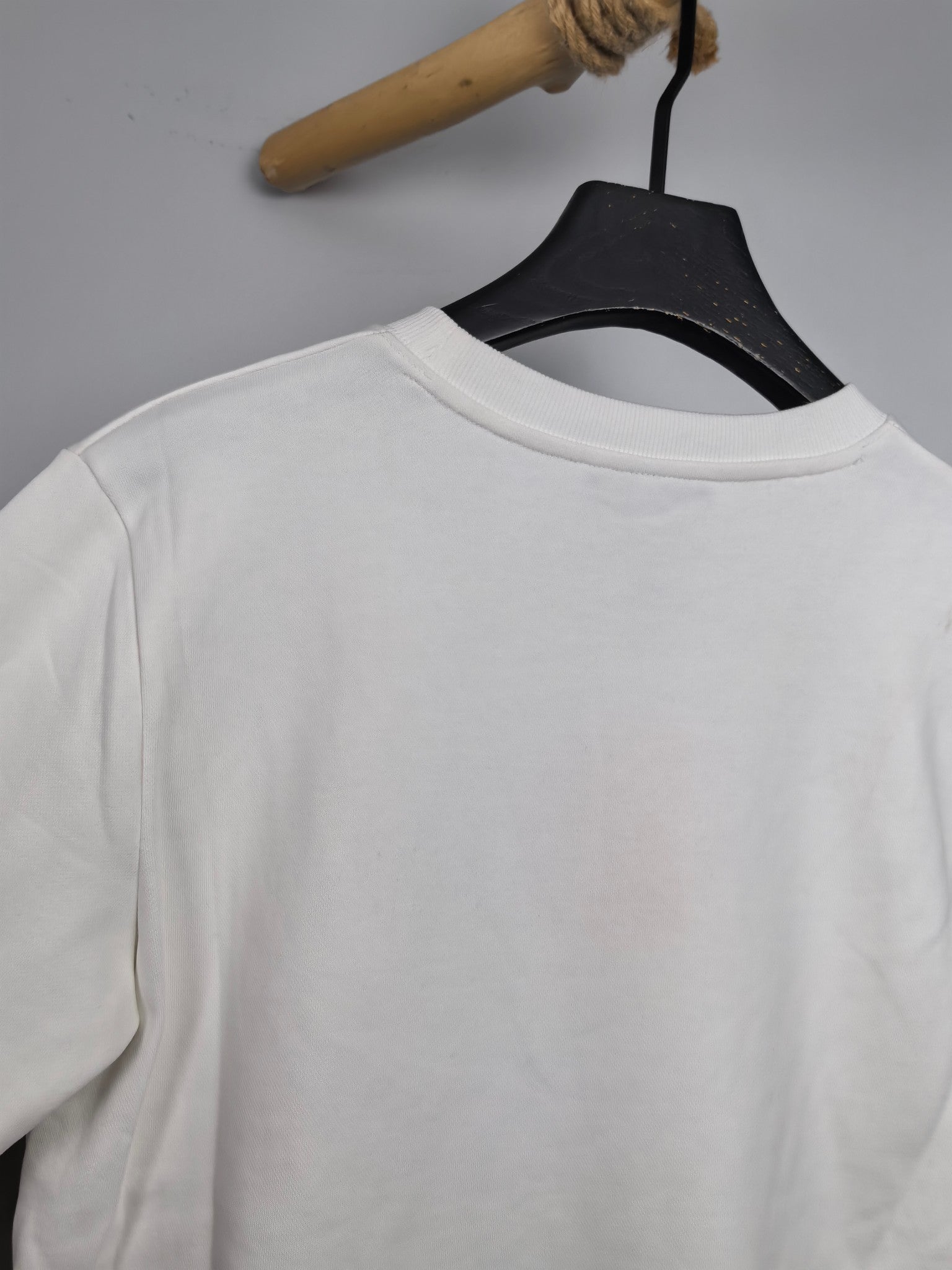 White sweatshirt back view with crew neckline