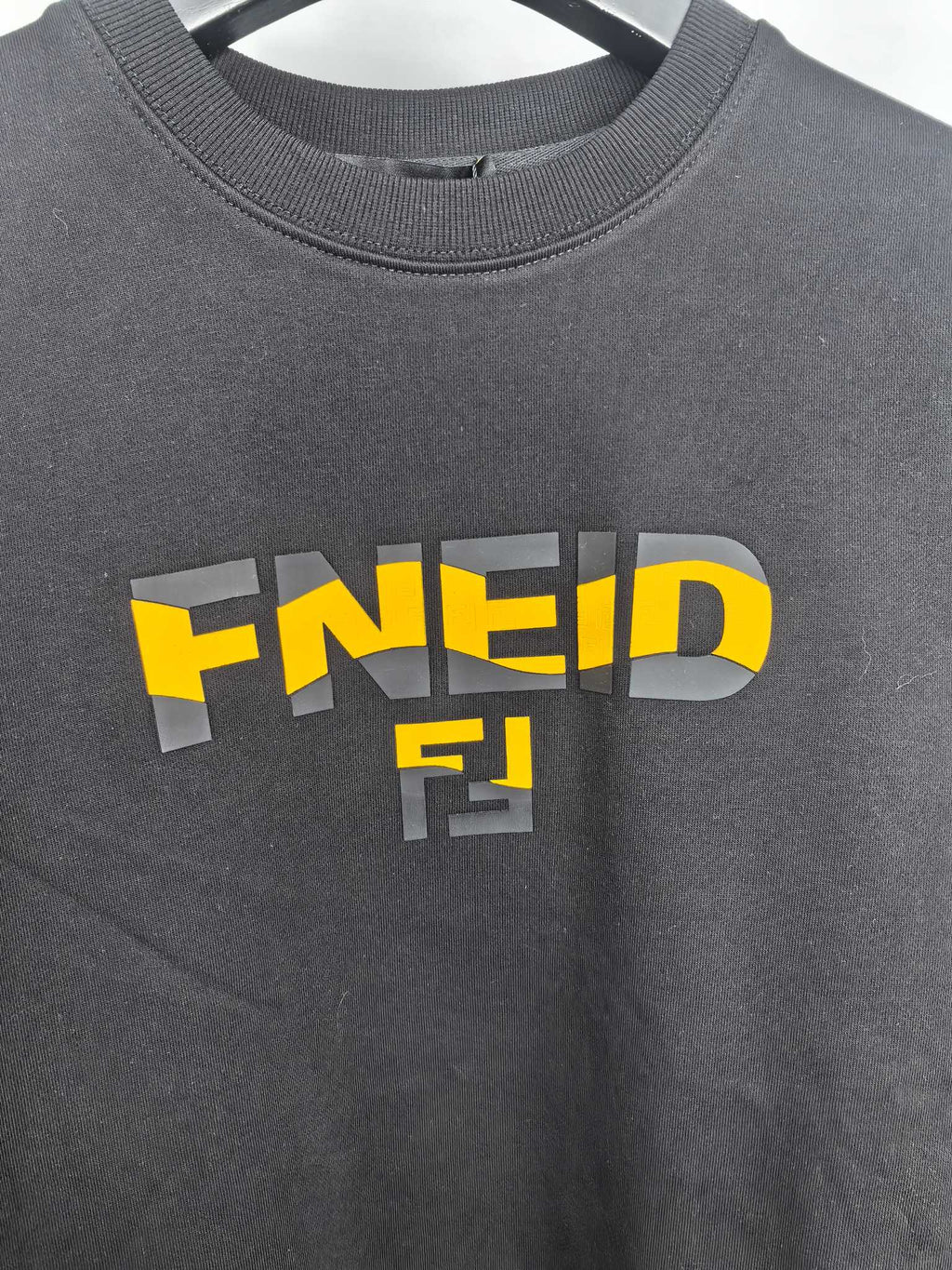 Fendi dark gray sweatshirt with large yellow Fendi logo graphic