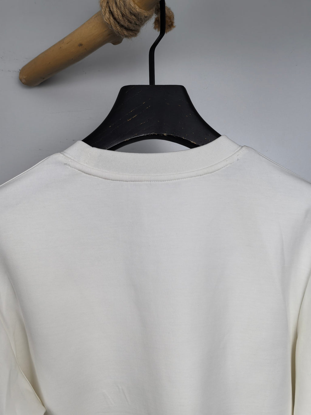 White crewneck sweatshirt back with neckline seam detail