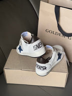 Back view of white low-top sneakers with blue star patch and black collar